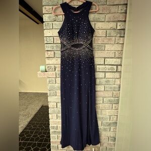 Morgan & Co. blue dress. mesh back and front pieces. slit in right leg.